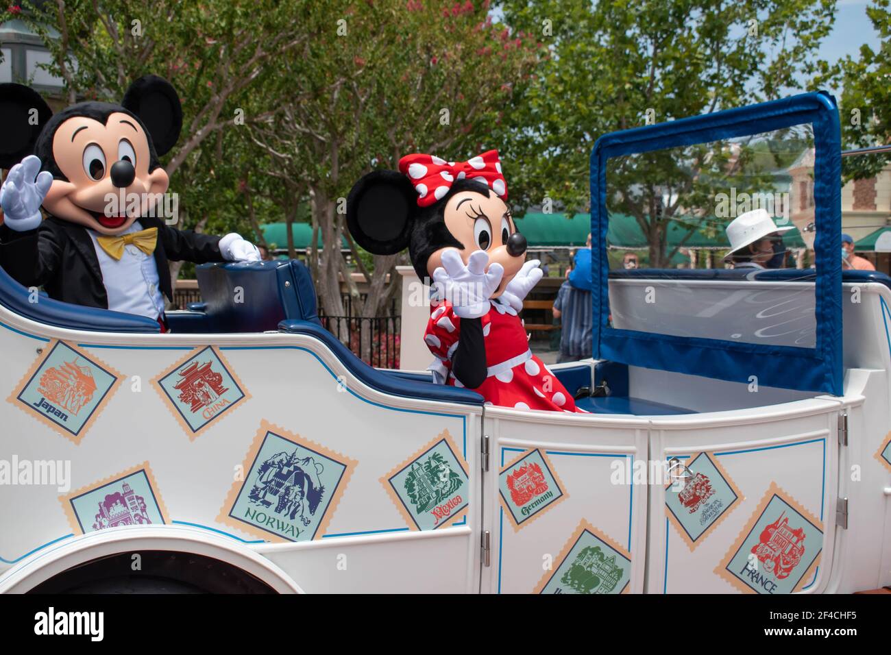 Orlando, Florida. July 29, 2020. Mickey and Minnie riding in a vintage ...