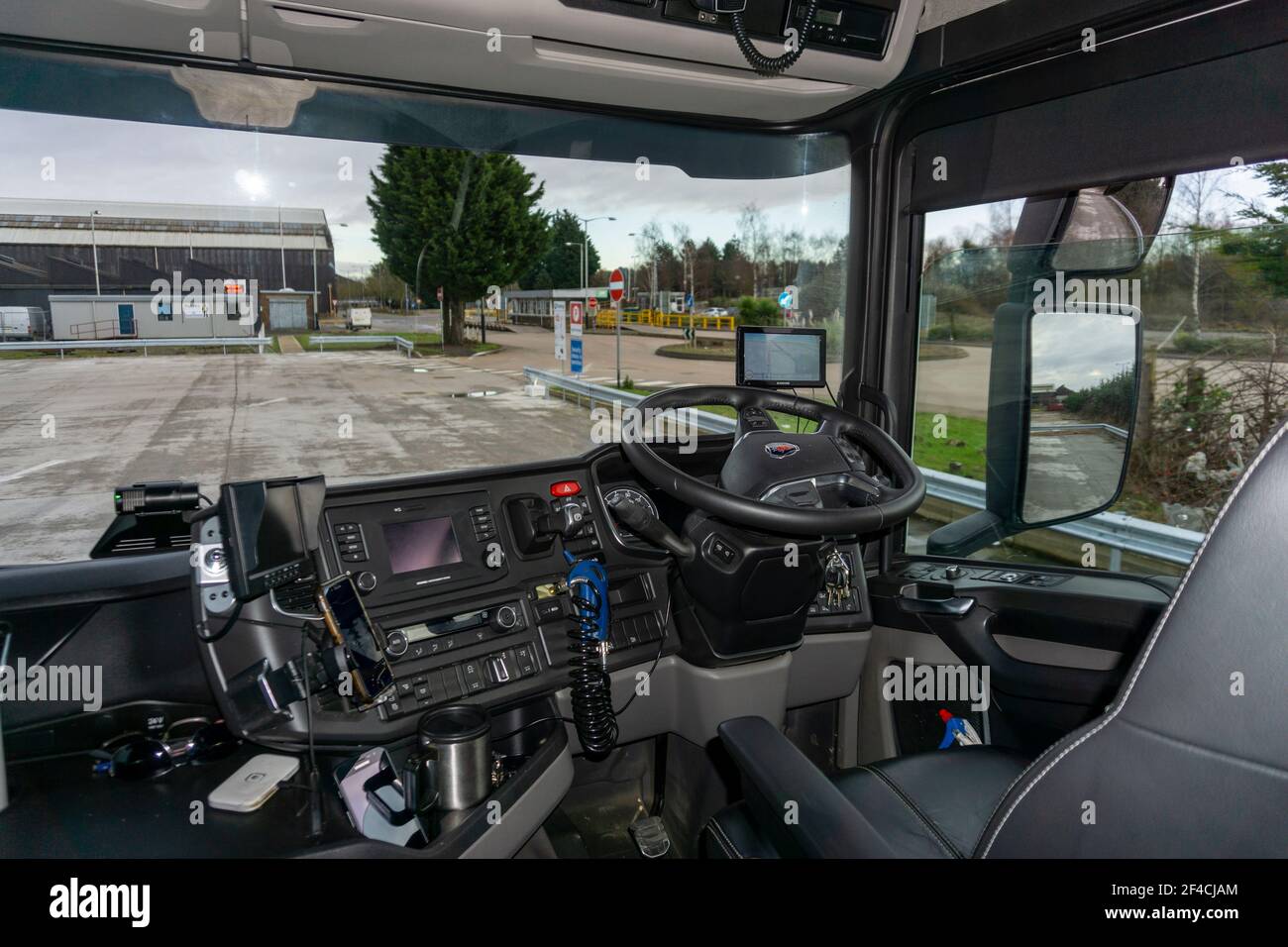 Scania V8 Semi Truck Interior View of Drivers Cockpit showing the controls  and Navigation Equipment and Camera Screens Stock Photo - Alamy