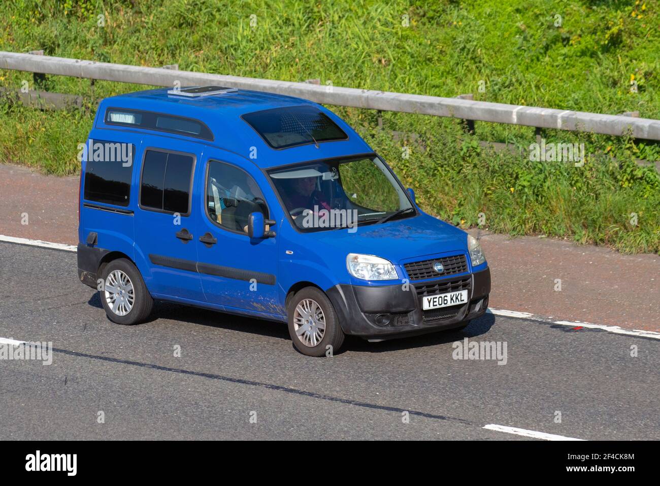 2006 Fiat Doblo Active M-Jet 1248cc diesel small MPV:  Vehicular traffic, moving vehicles, cars, vehicle driving on UK roads, motors, motoring on the M6 highway English motorway road network Stock Photo