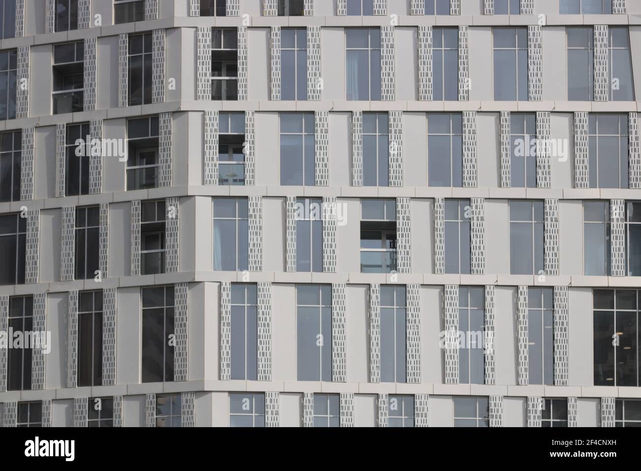 Steel, concrete and glass facade of a modern skyscraper Stock Photo
