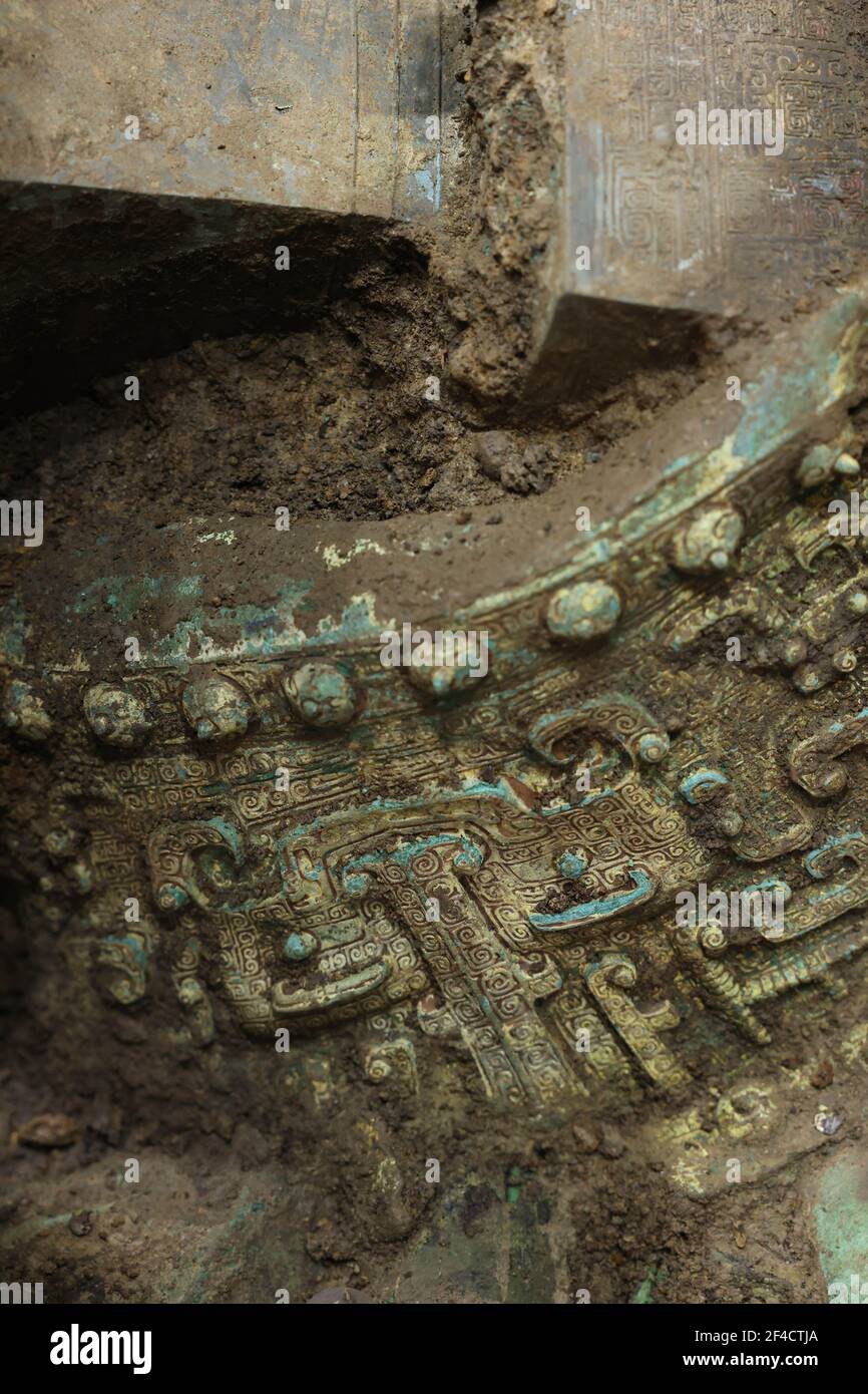 (210320) -- CHENGDU, March 20, 2021 (Xinhua) -- Undated photo provided by the Sanxingdui Ruins sacrificial pits archaeological project shows part of a bronze ware unearthed from the Sanxingdui Ruins site in southwest China's Sichuan Province. Chinese archaeologists announced Saturday that some new major discoveries have been made at the legendary Sanxingdui Ruins site in southwest China, helping shed light on the cultural origins of the Chinese nation.   Archaeologists have found six new sacrificial pits and unearthed more than 500 items dating back about 3,000 years at the Sanxingdui Ruins in Stock Photo