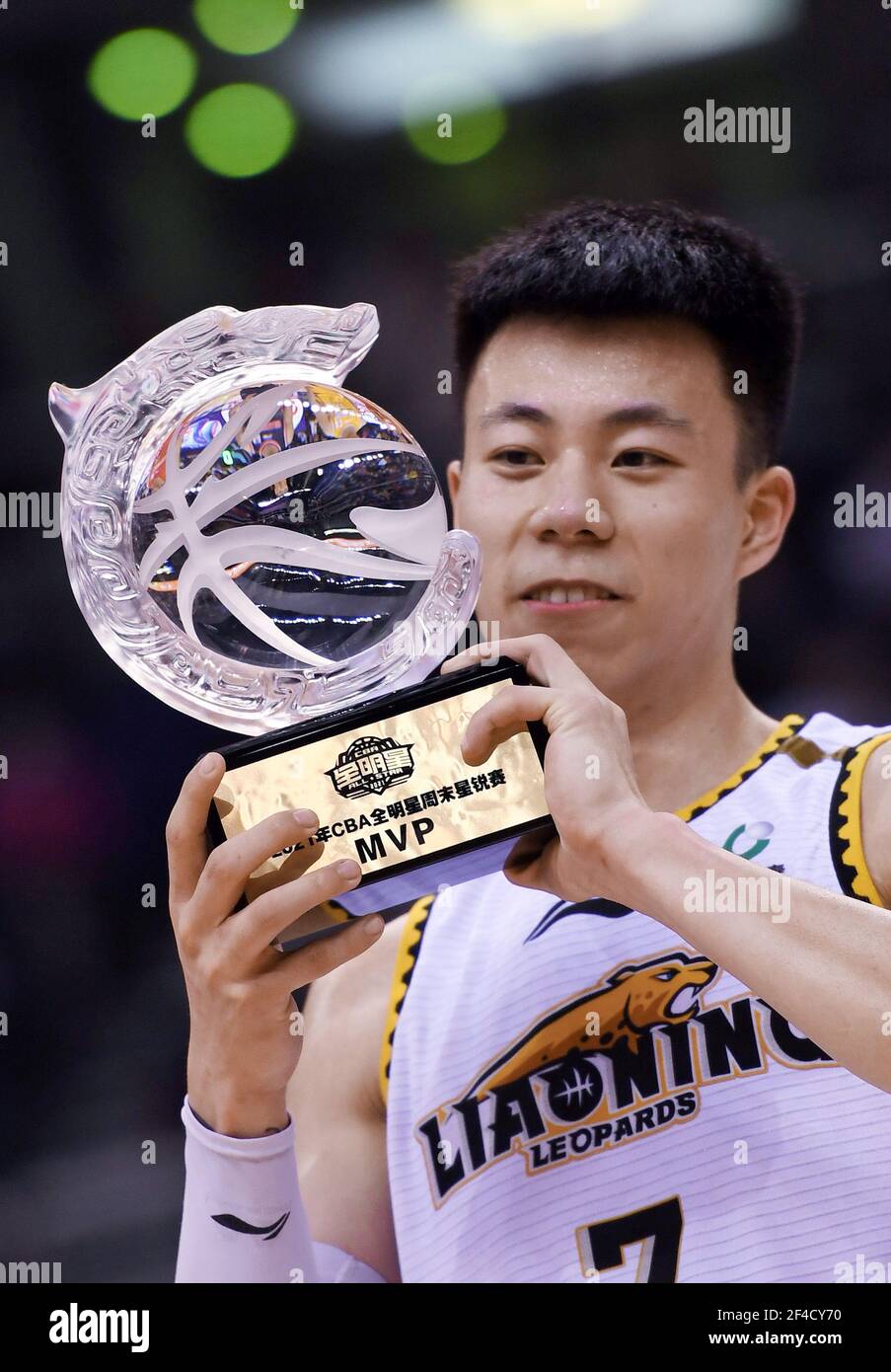 Qingdao, China's Shandong Province. 20th Mar, 2021. Zhang Zhenlin of the North Team poses with his MVP trophy after the CBA All-Star Rookie Challenge at the 2020-2021 Chinese Basketball Association (CBA) league in Qingdao, east China's Shandong Province, March 20, 2021. Credit: Li Ziheng/Xinhua/Alamy Live News Stock Photo