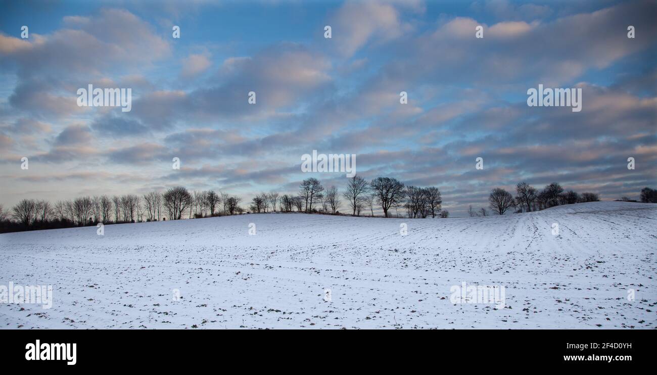 Cloudy sky over a field covered by snow  Denmark in Zealand region 2013 Stock Photo