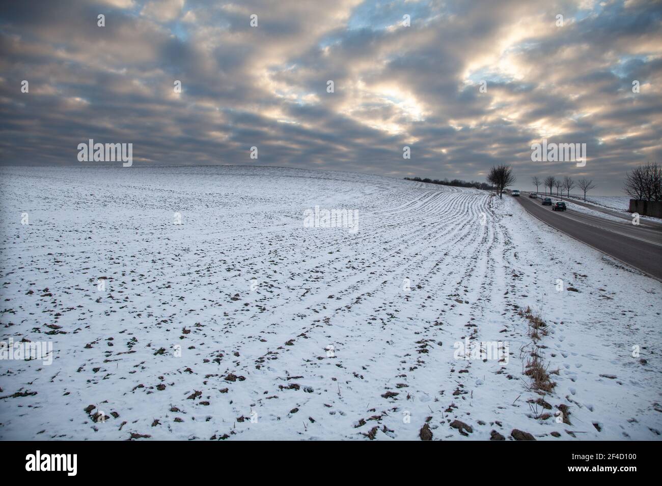 Cloudy sky over a field covered by snow  Denmark in Zealand region 2013 Stock Photo