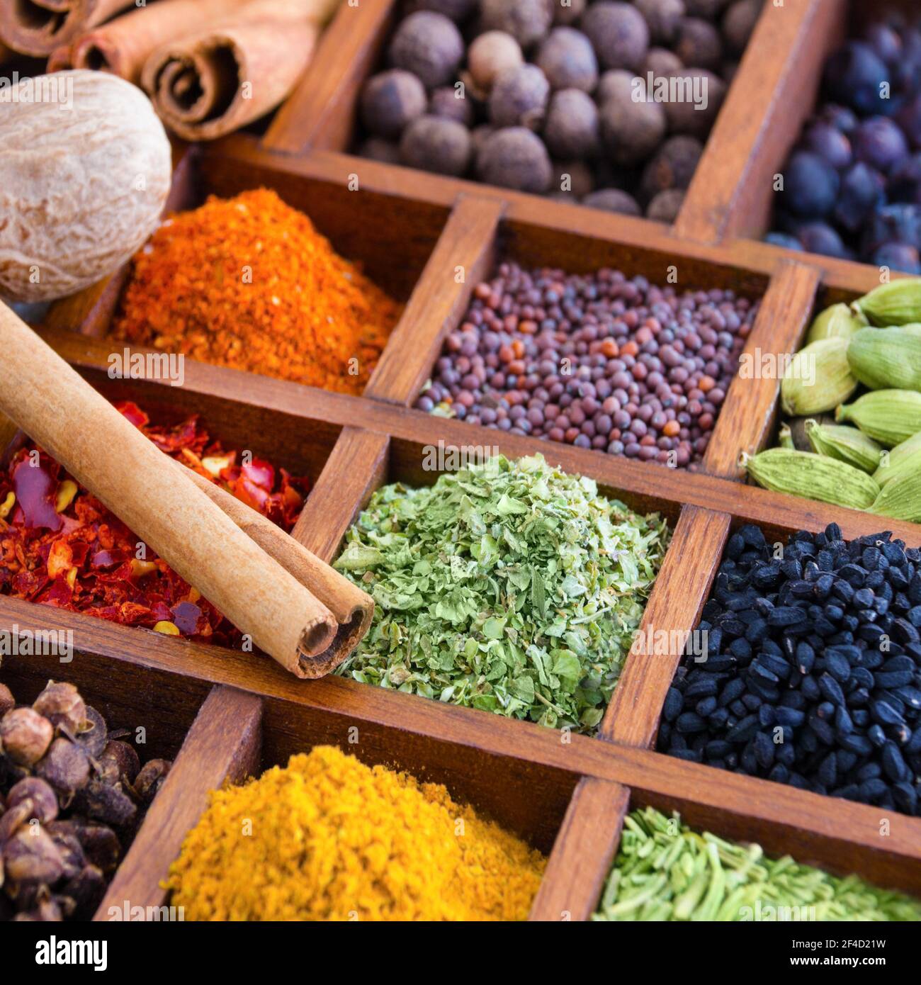 Various spicery in wooden box close up Stock Photo