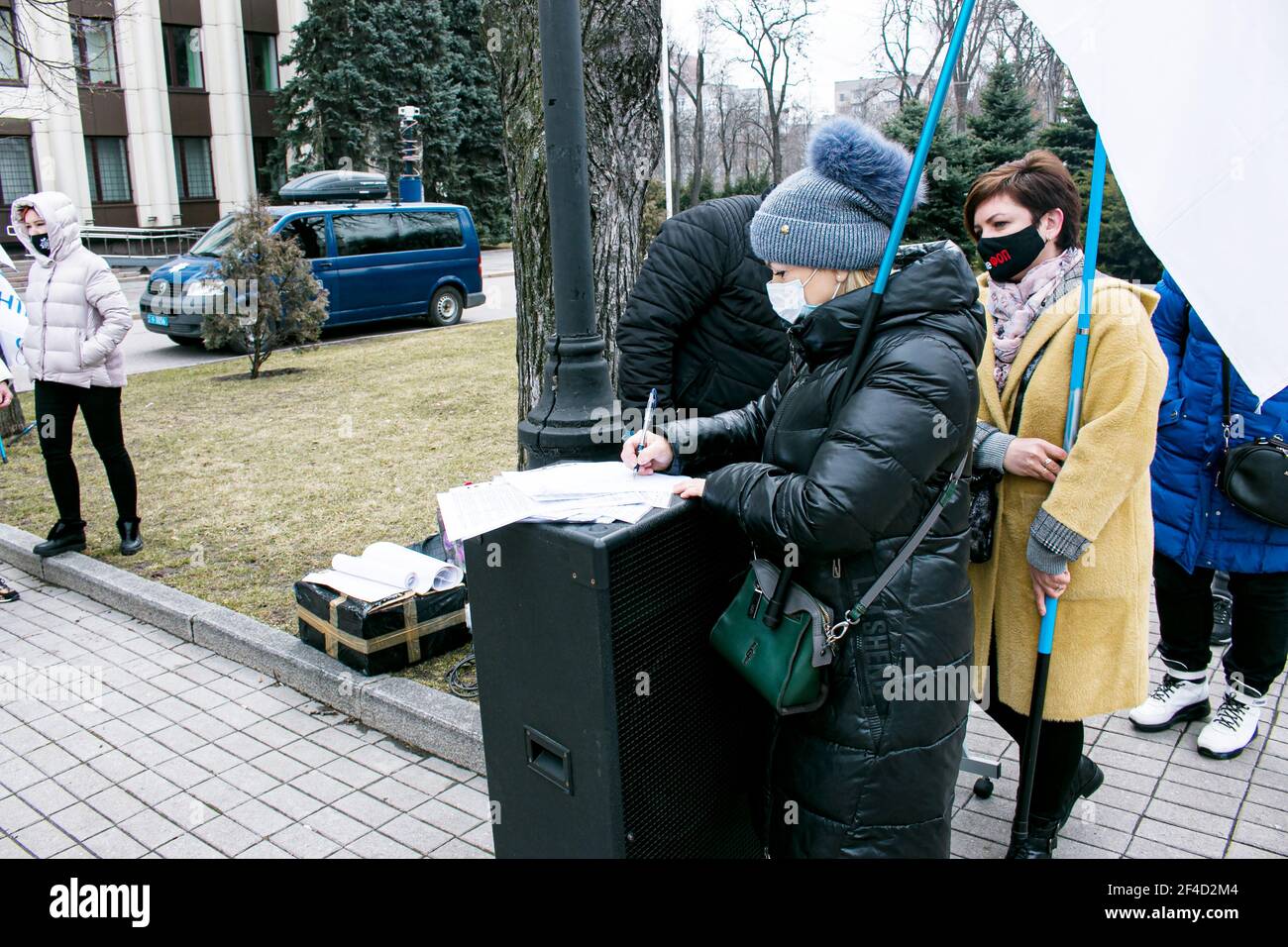 Dnepropetrovsk, Ukraine - 03.19.2021: Businessmen gathered to protest against the introduction of the lockdown and sign a petition to the authorities. Stock Photo