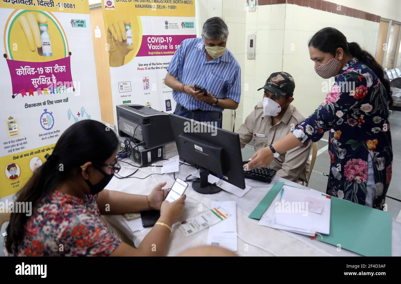 People register to receive a Covid-19 vaccine COVAXIN developed by Bharat Biotech at a government dispensary during the countrywide vaccination drive.Vaccination drive has been initiated to cover citizen above 60 years and above 45 years of age suffering from comorbid conditions. Stock Photo