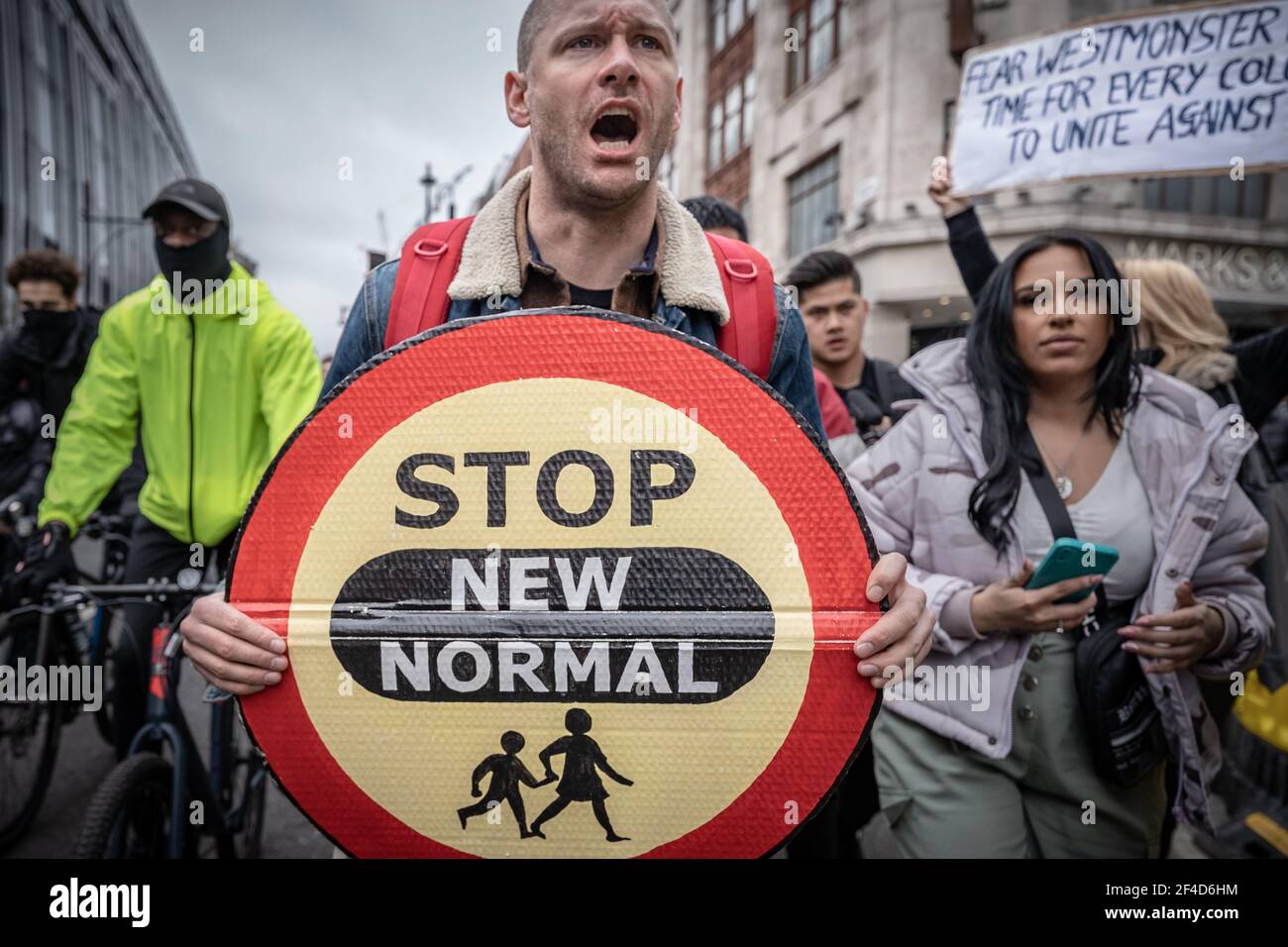 London, UK. 20th March, 2021. Coronavirus: Thousands of anti-lockdown demonstrators march under heavy police surveillance from Hyde Park to Westminster. Credit: Guy Corbishley/Alamy Live News Stock Photo