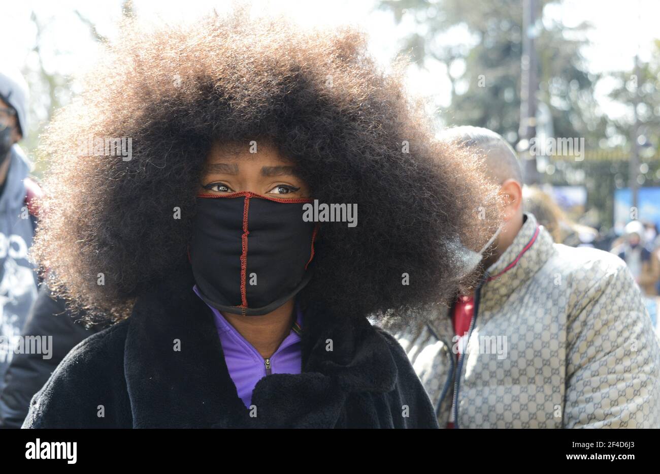 Assa Traore, sister of Adama Traore, during the Demonstration against systemic racism, police, prison and judicial violence in Paris, France, on March 20, 2021. Some thousands of demonstrators from the families of the victims, undocumented wave collectives marched from the gates of the Luxembourg Gardens to demand the application of their slogan: 'stop impunity'. Photo by Georges Darmon/Avenir Pictures/ABACAPRESS.COM Photo by Georges Darmon/Avenir Pictures/ABACAPRESS.COM Stock Photo