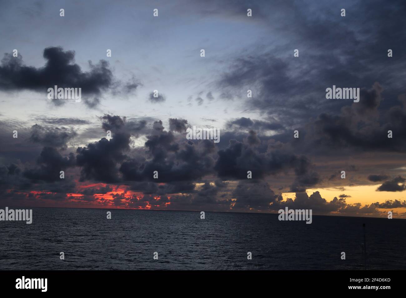 sunrise over ocean Stock Photo - Alamy