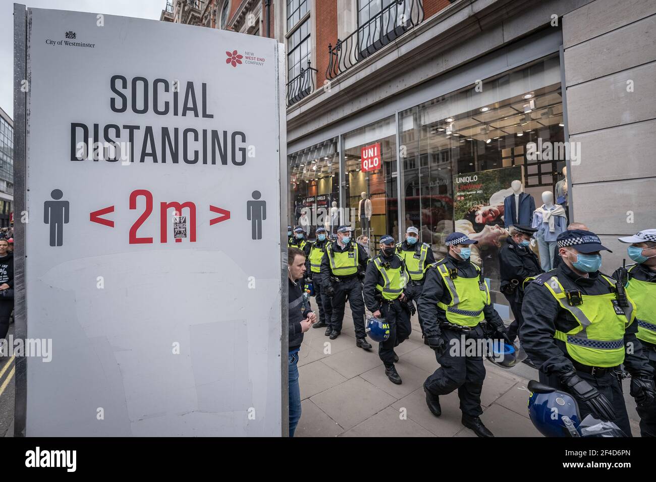London, UK. 20th March, 2021. Coronavirus: Thousands of anti-lockdown demonstrators march under heavy police surveillance from Hyde Park to Westminster. Credit: Guy Corbishley/Alamy Live News Stock Photo