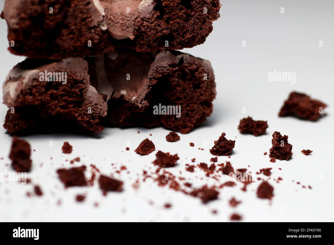 Close Up of Chocolate Donuts with Crumbs Stock Photo