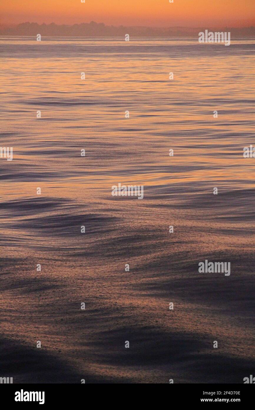 sunrise over ocean Stock Photo - Alamy
