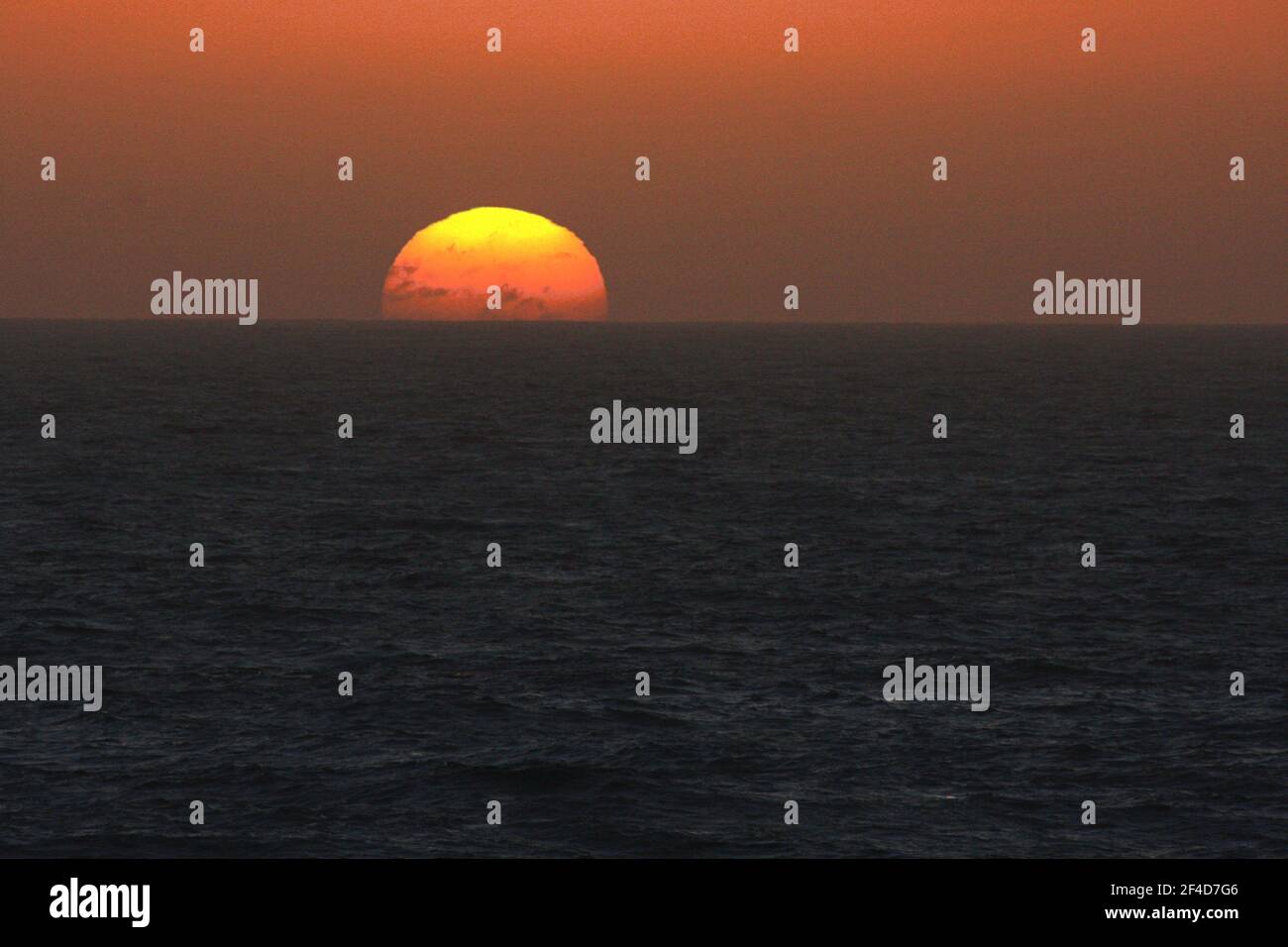 sunrise over ocean Stock Photo - Alamy
