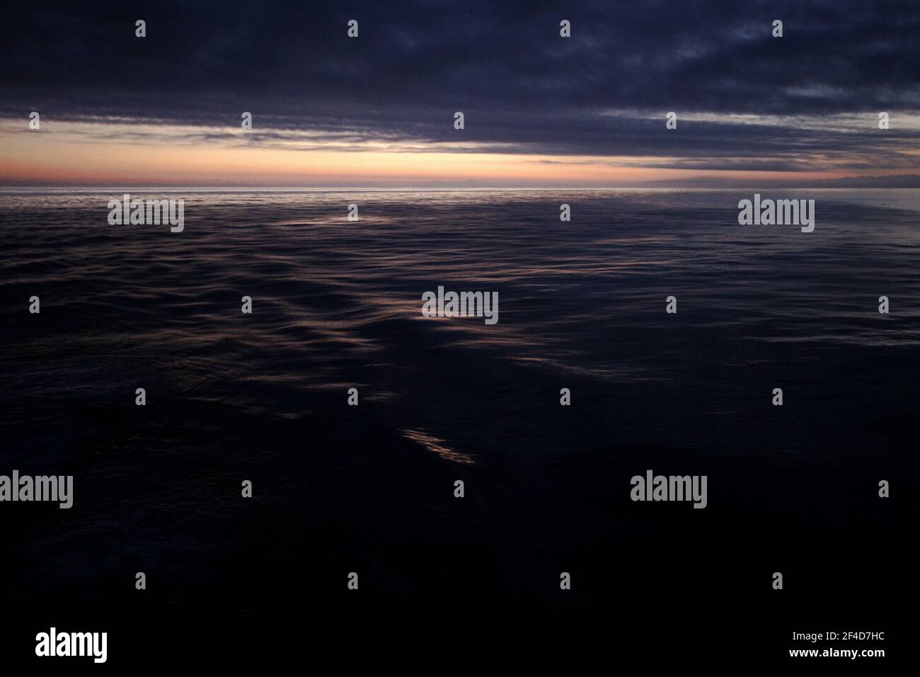 sunrise over ocean Stock Photo - Alamy
