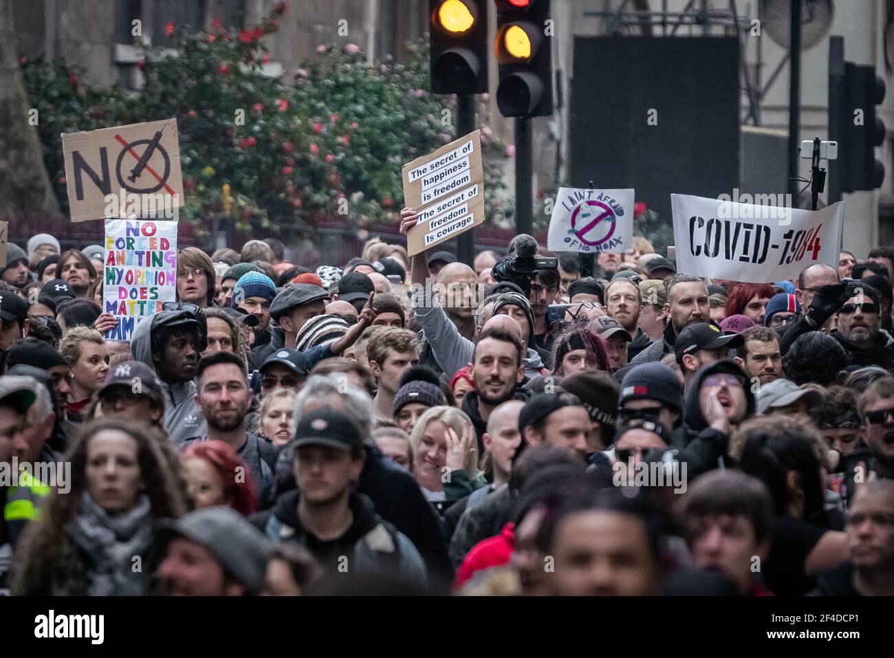 London, UK. 20th March, 2021. Coronavirus: Thousands of anti-lockdown demonstrators march under heavy police surveillance from Hyde Park to Westminster. Credit: Guy Corbishley/Alamy Live News Stock Photo