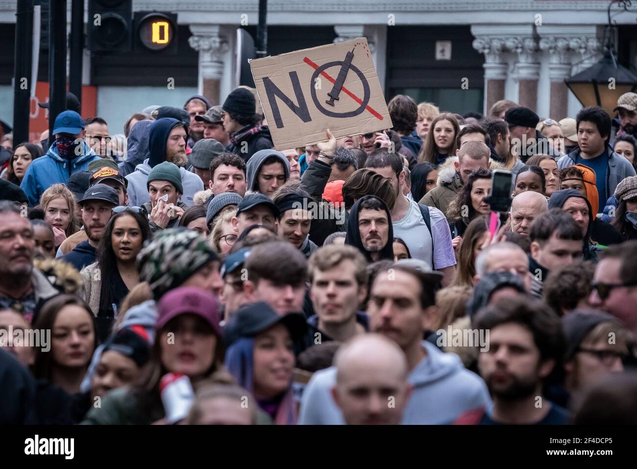 London, UK. 20th March, 2021. Coronavirus: Thousands of anti-lockdown demonstrators march under heavy police surveillance from Hyde Park to Westminster. Credit: Guy Corbishley/Alamy Live News Stock Photo