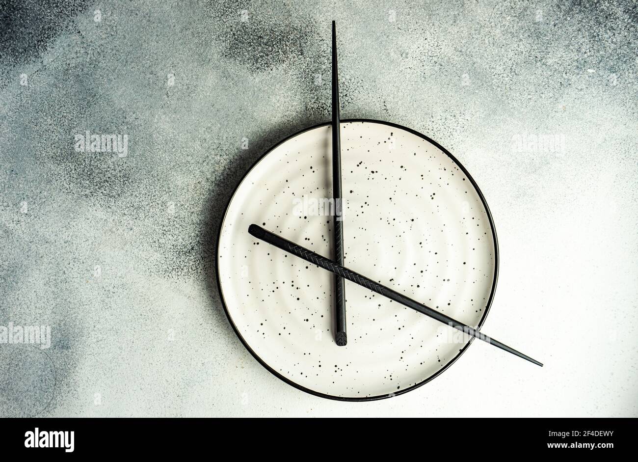 Minimalistic intermittent fasting concept Stock Photo