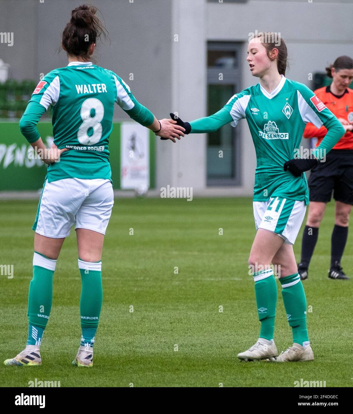 Sophie Walter (#8 SV Werder) and Ina Timmermann (#21 SV Werder) after final  whistle in the DFB Cup round of 8 between VfL Wolfsburg and SV Werder  Bremen at the AOK Stadium