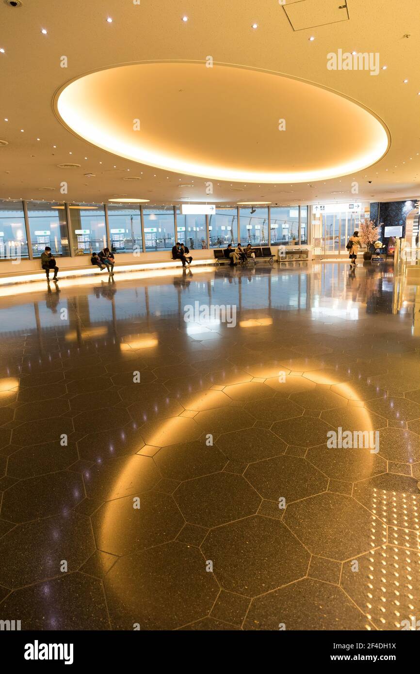 Seating area in Haneda Tokyo International Airport with reflection of
