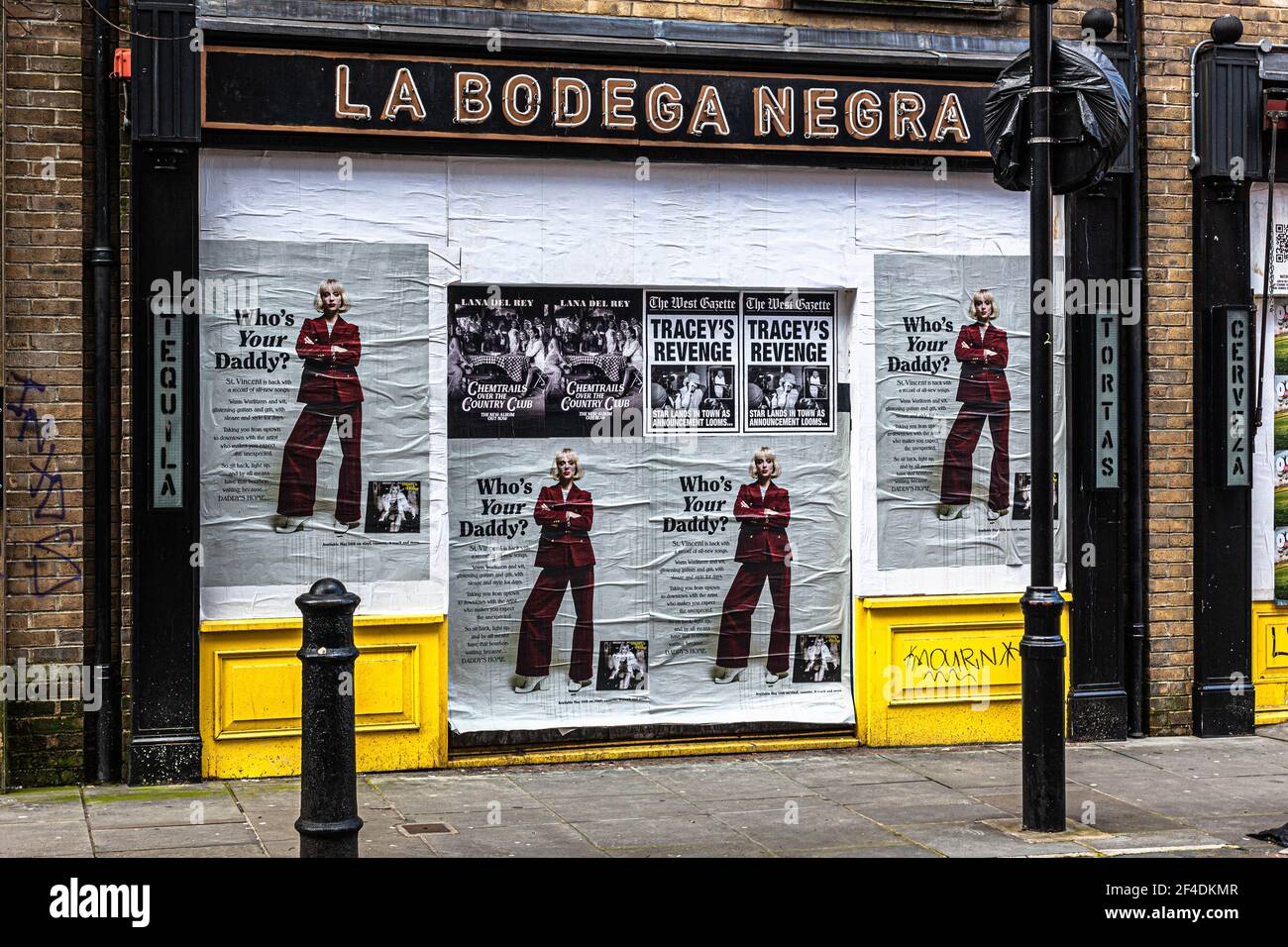 La Bodega Negra facade covered with promotional posters, Soho, London, England, UK. Stock Photo