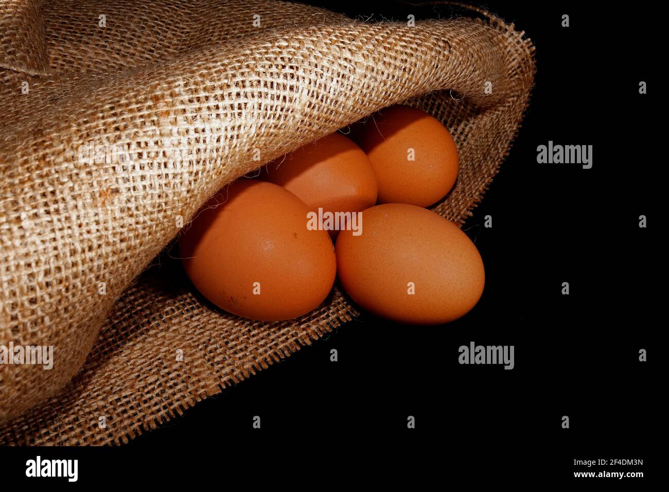 Fresh organic chicken eggs in burlap sack Stock Photo - Alamy