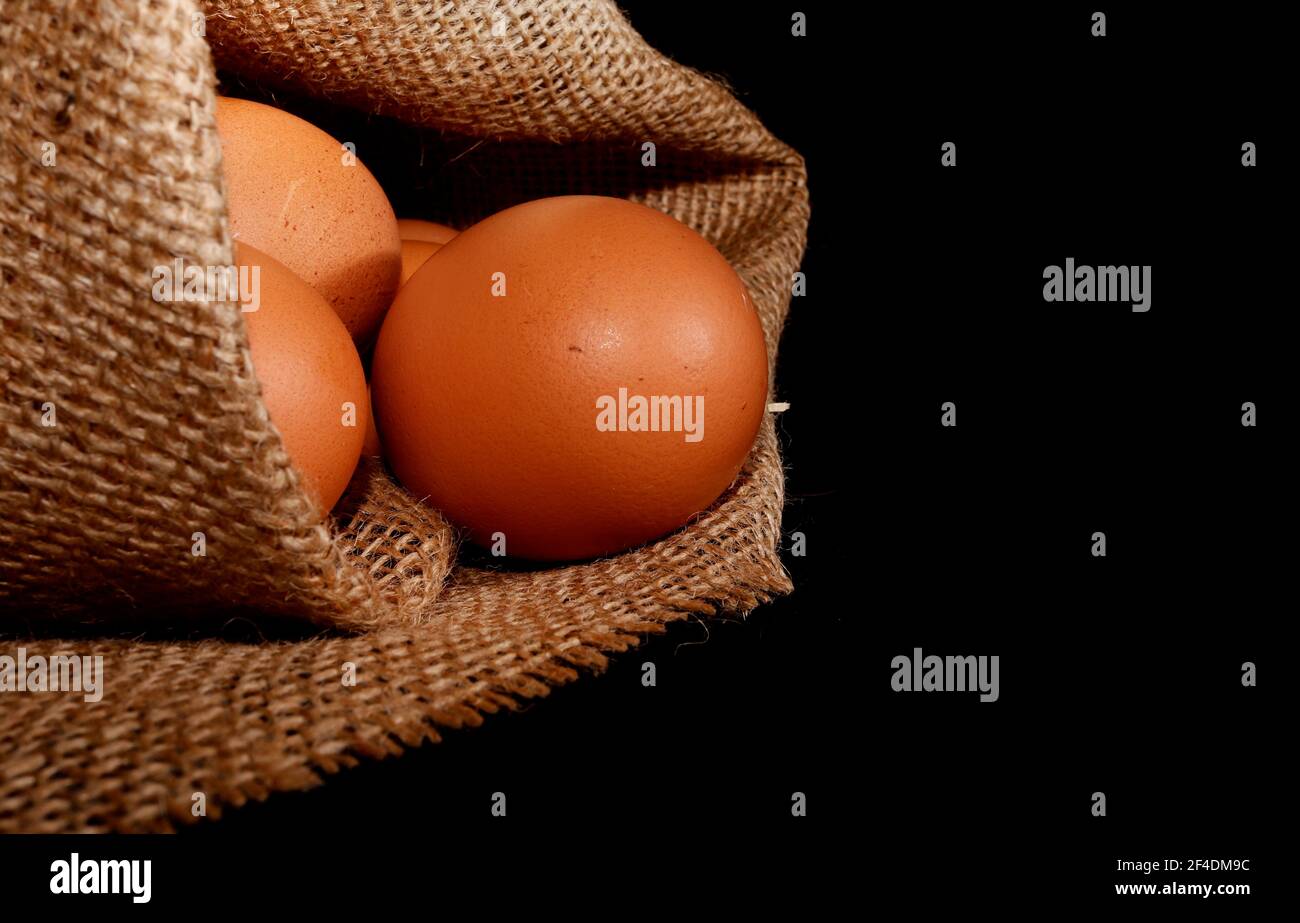 Fresh organic chicken eggs in burlap sack Stock Photo - Alamy