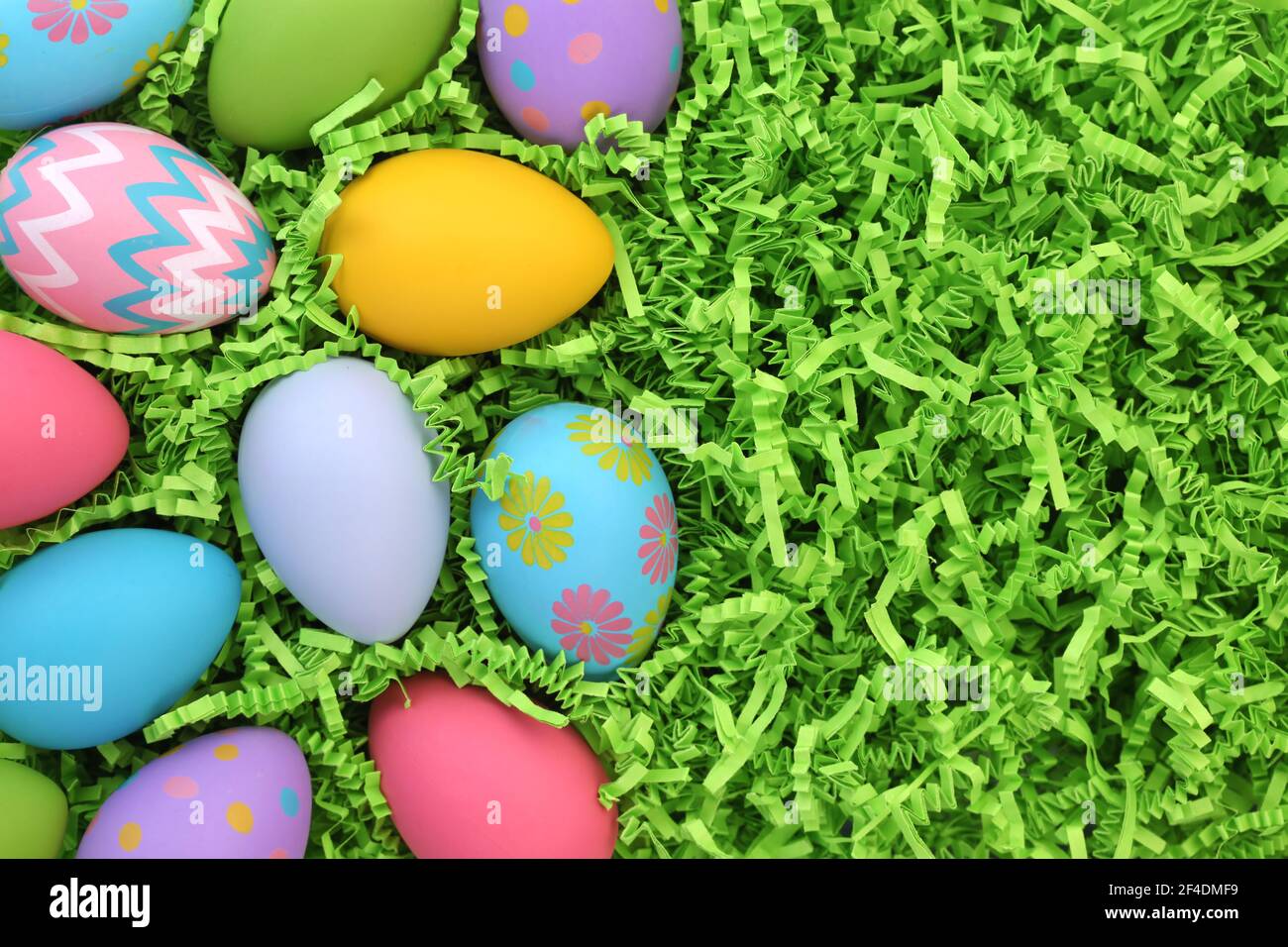 Collection of colorful Easter eggs on Easter grass background Stock Photo Alamy