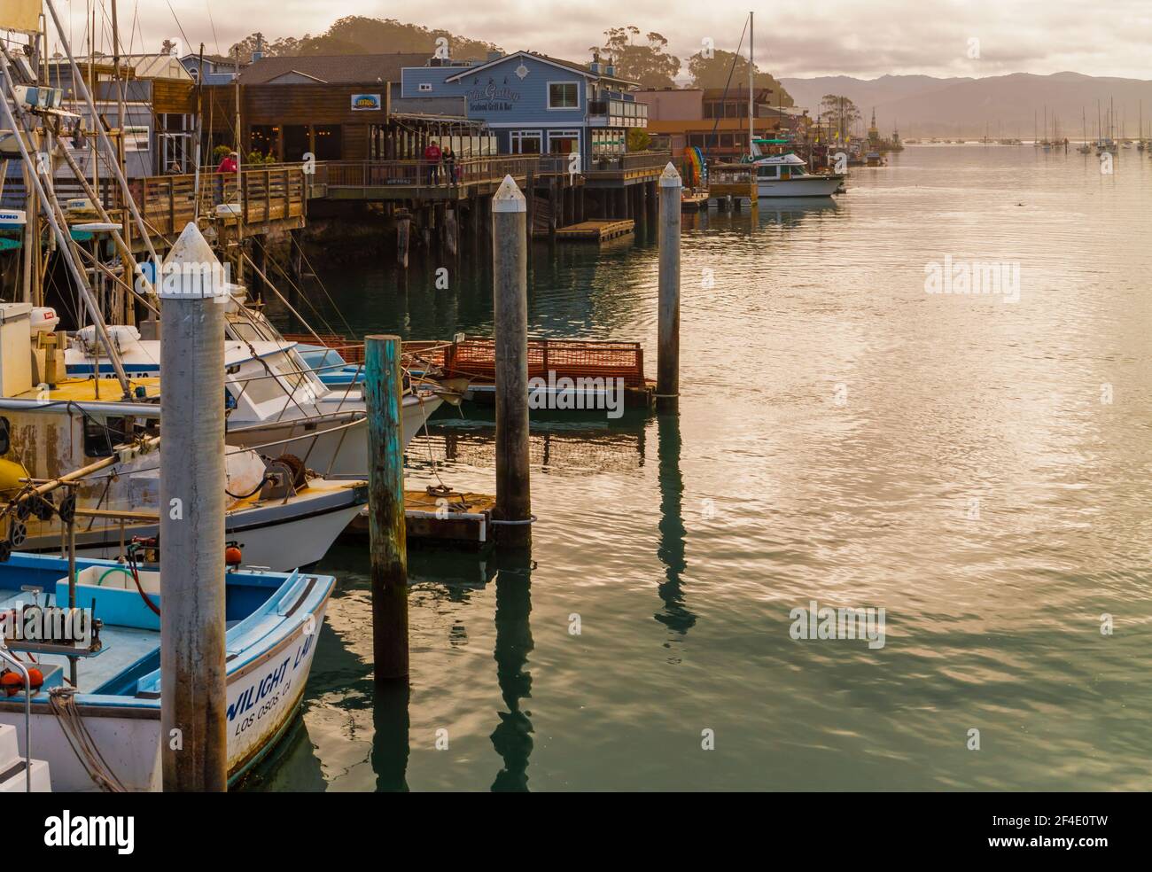 Fishing Boats Docked at Morro Bay Marina With Fog Shrouded Valencia