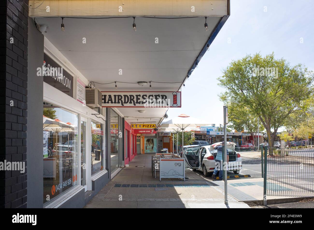 The local shops along the street in Lara's town center. Lara is a small town in Victoria, Australia. Stock Photo