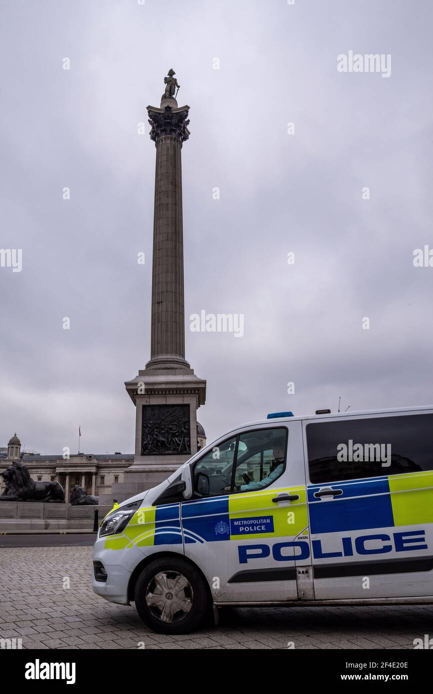 Police preparing for an anti lockdown, anti policing bill, protest rally in London, UK, protecting Nelson's Column and Trafalgar Square Stock Photo