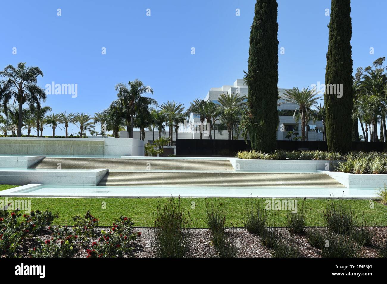 GARDEN GROVE, CALIFORNIA - 20 MAR 2021: Grounds at the Crystal Cathedral, with the Christ Cathedral Academy building in the background. Stock Photo