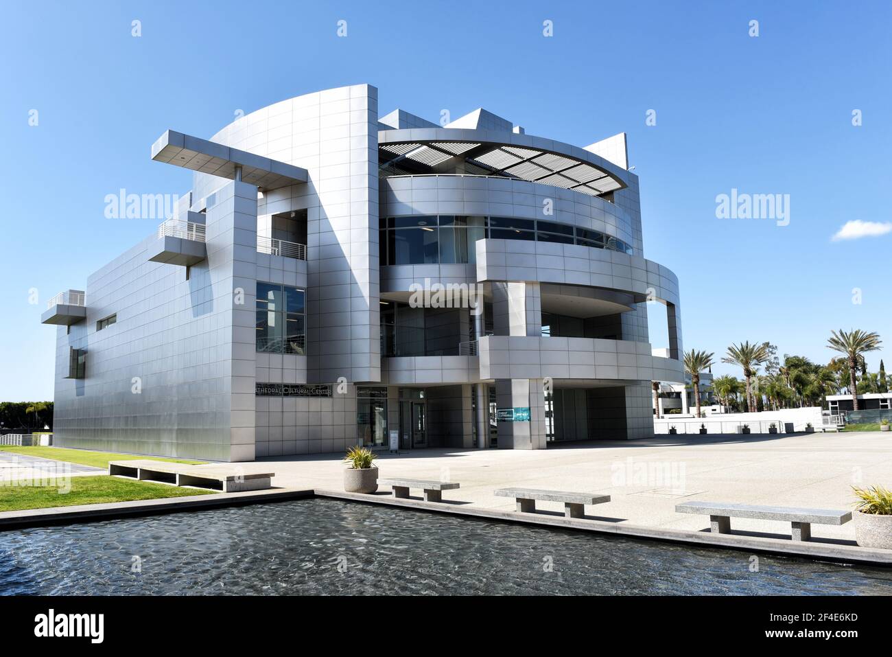 GARDEN GROVE, CALIFORNIA - 20 MAR 2021: Cultural Center at the Crystal Cathedral with pool in the foreground. Stock Photo