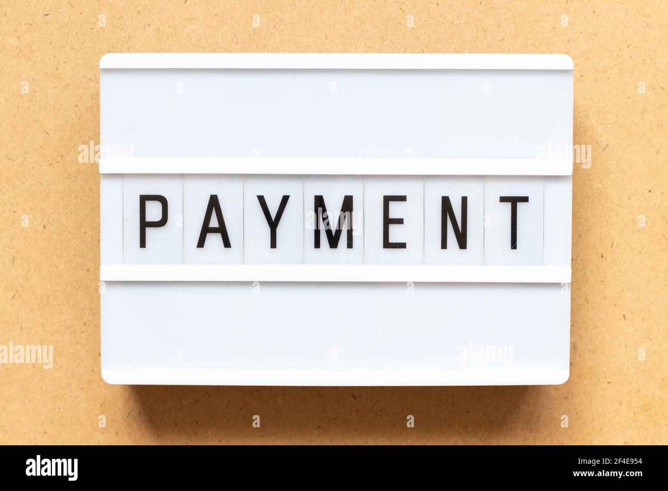 Lightbox with word payment on wood background Stock Photo
