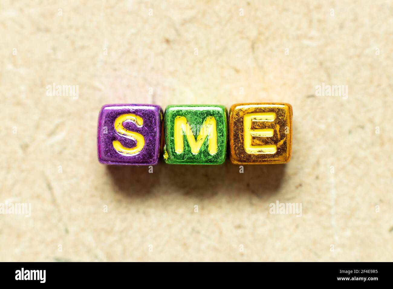 Metallic color alphabet letter block in word SME (abbreviation of Small ...