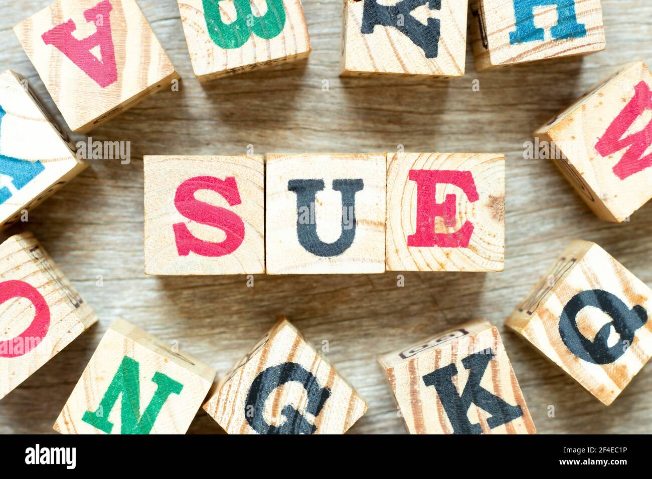 Alphabet letter block in word sue with another on wood background Stock Photo Alamy