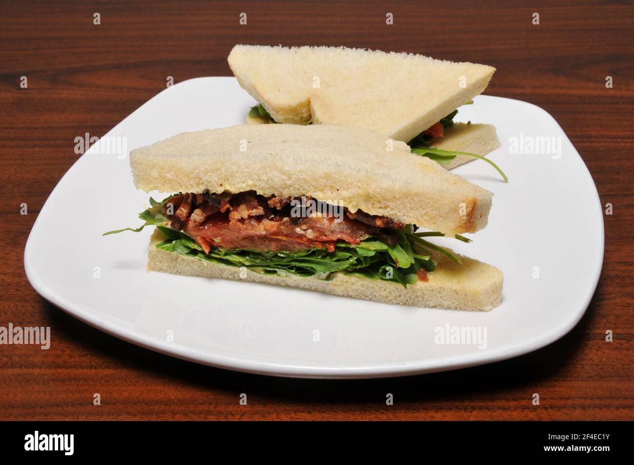 Italian finger sandwich known as Tramezzini Pancetta Stock Photo Alamy