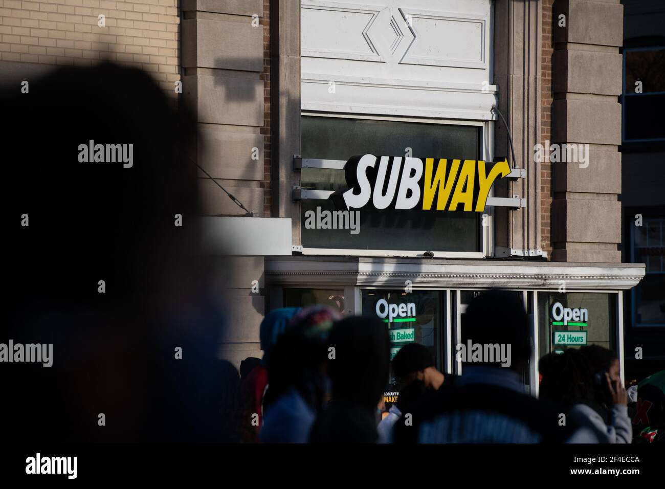 Washington, USA. 14th Mar, 2021. Pedestrians in front of a Subway storefront in Washington, DC, on Sunday, March 14, 2021, amid the coronavirus pandemic. (Graeme Sloan/Sipa USA) Credit: Sipa USA/Alamy Live News Stock Photo