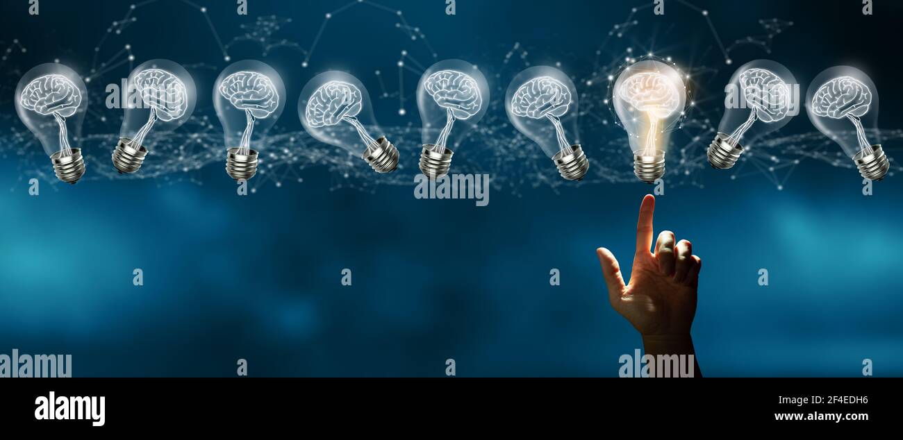 Businessman fingertip on Light bulbs with Brain inside and glowing one different idea. Creative and innovation inspiration. Business Bright idea conce Stock Photo