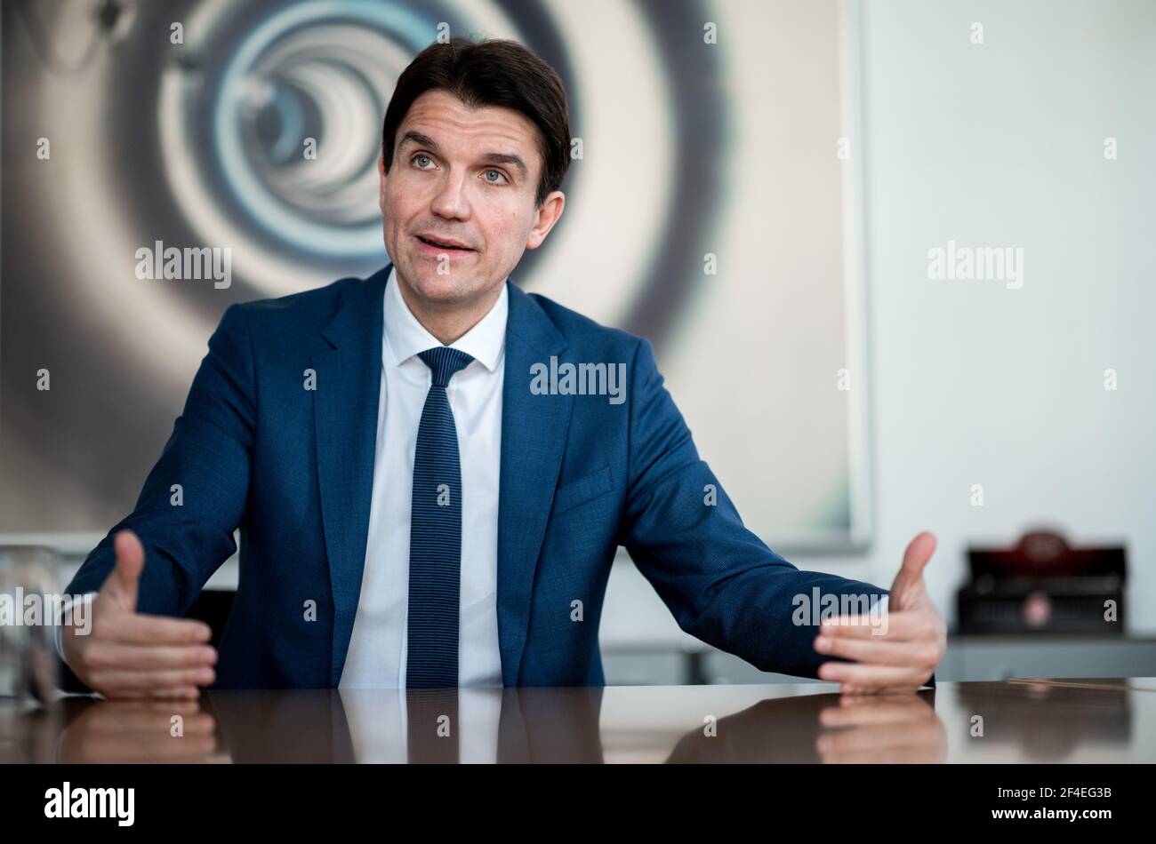 Essen, Germany. 25th Feb, 2021. Uli Paetzel, Chairman of the Board of the Emschergenossenschaft water management association, sits in a conference room and talks in an interview about the Emscher conversion in the Ruhr region. Credit: Fabian Strauch/dpa/Alamy Live News Stock Photo