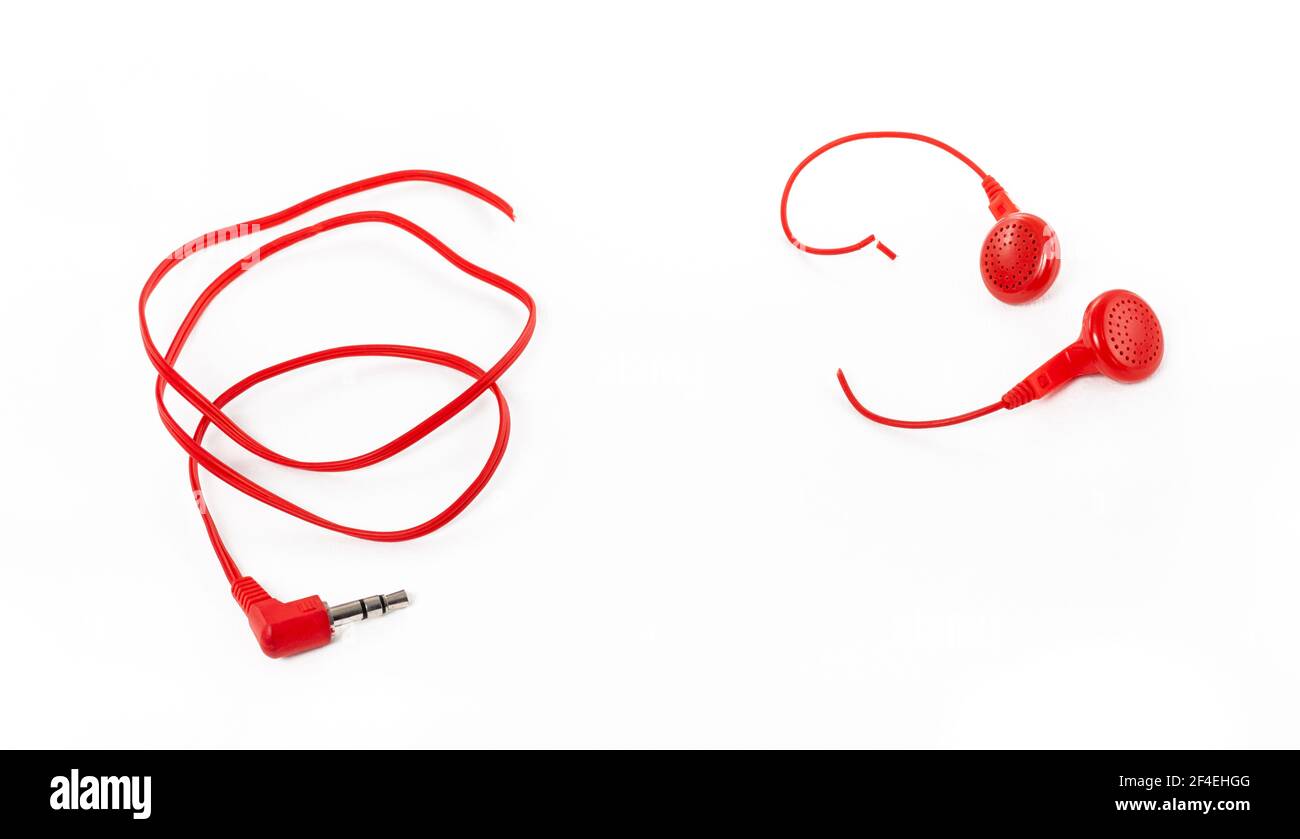 Headphones on a white background. Torn headphones. Repair of
