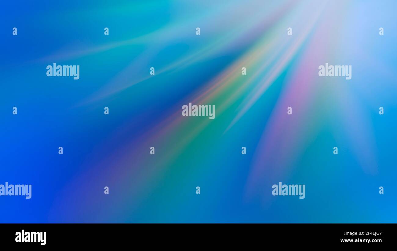 Abstract blue background with rainbow rays. Stock Photo