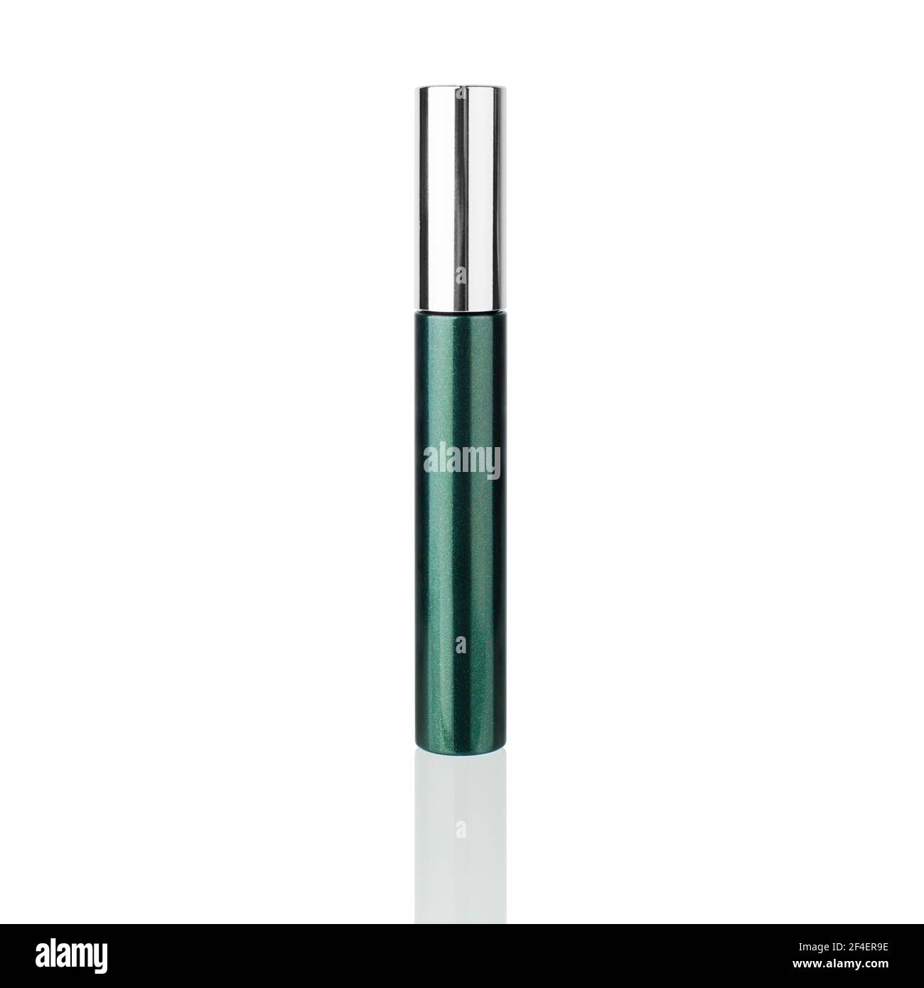 Closed mascara green plastic tube silver metal cap white background mirror reflection isolated closeup, eye mascara container eyelash cosmetic package Stock Photo
