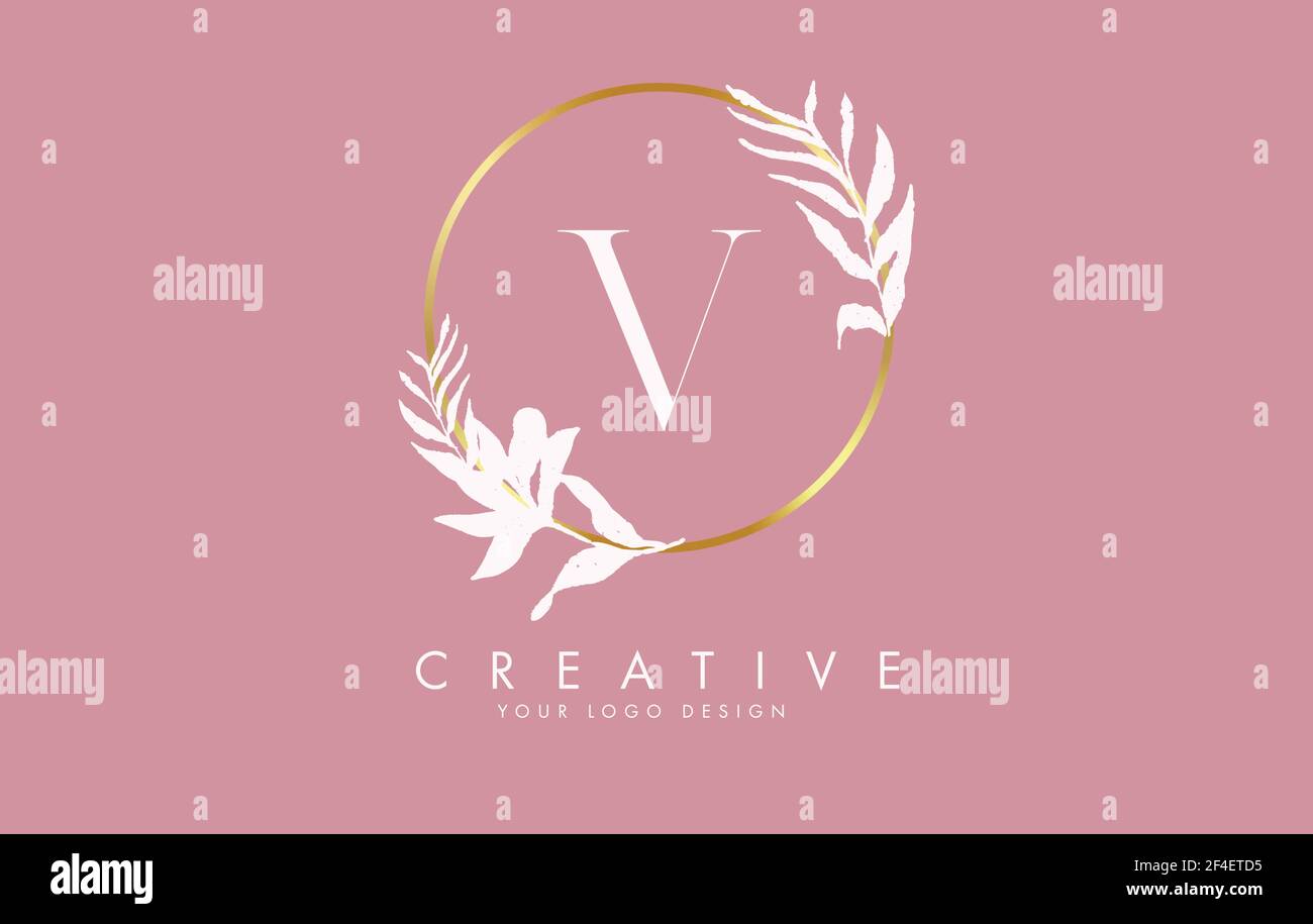 V Letter logo design with golden circles and white leaves on branches ...