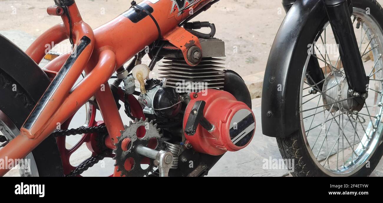Engine components of an old scooter. Means of transport. Individual