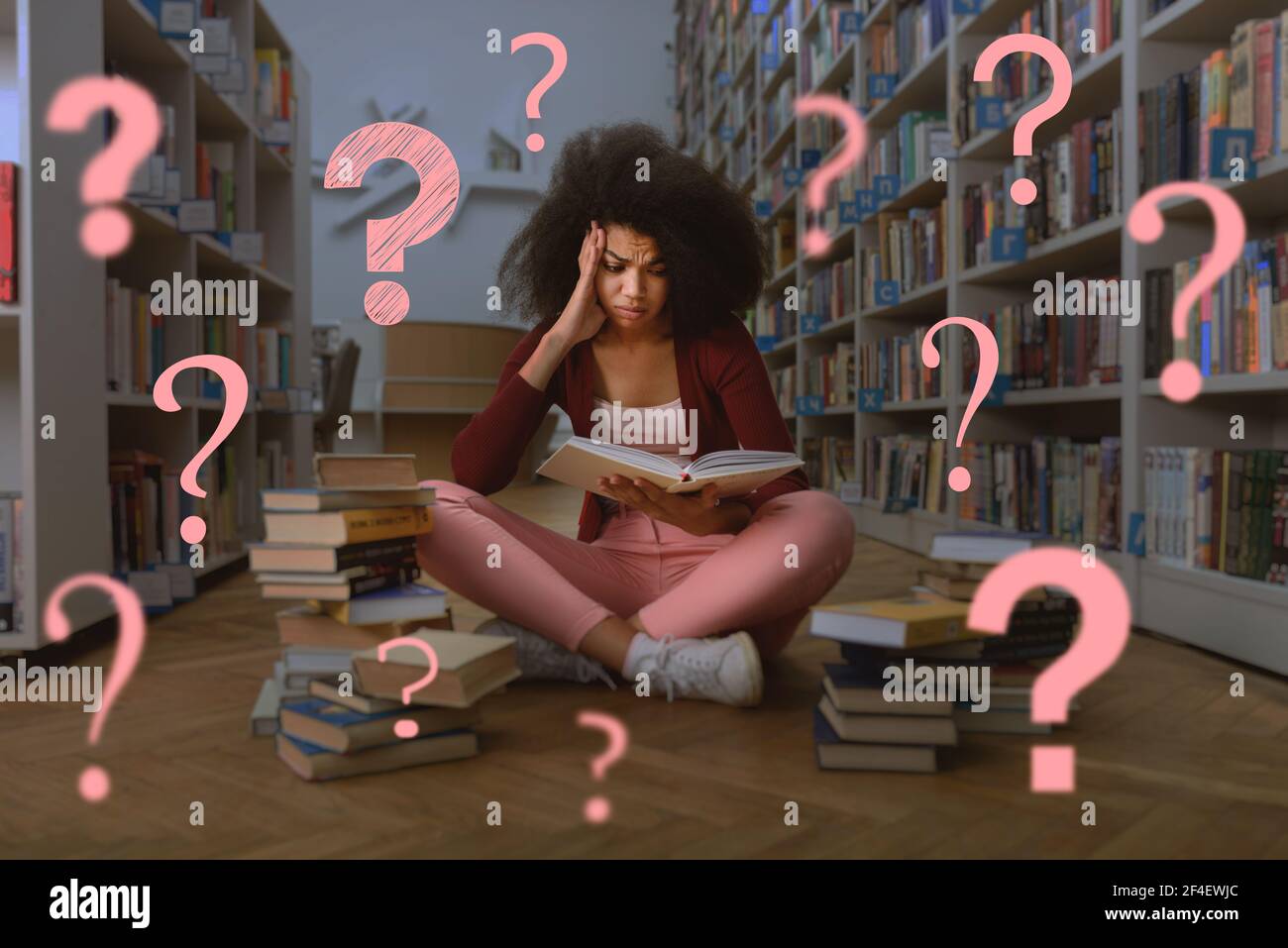 Tired university student has difficulty to study. Concept of stress, question and difficulty Stock Photo
