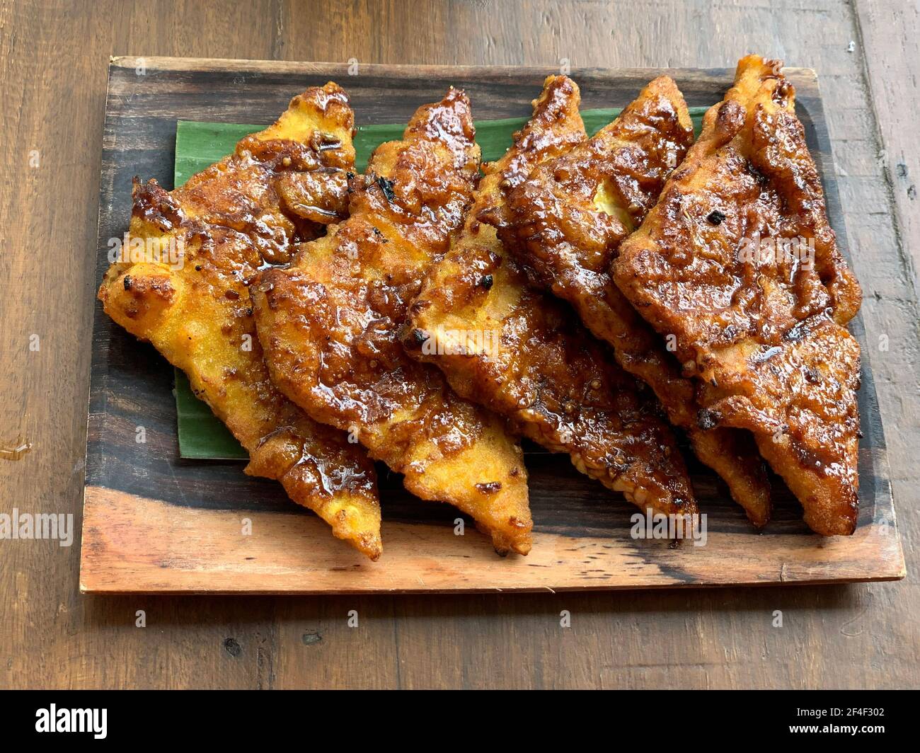Indonesian grilled tempe or tempeh with sweet soy sauce Stock Photo Alamy
