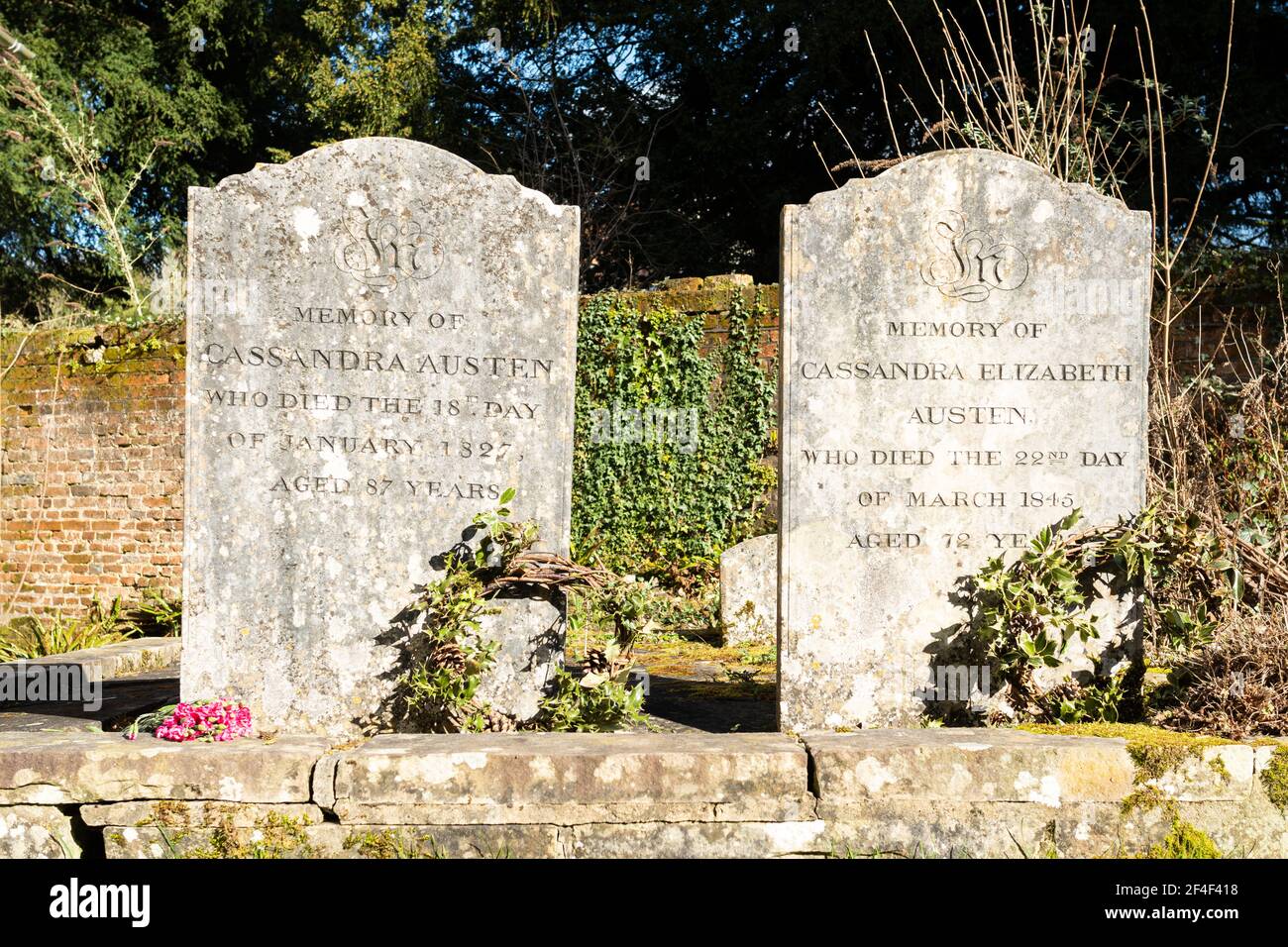 Graves of author Jane Austen's mother and sister in the churchyard of St Nicholas Church in the Hampshire village of Chawton, England, UK. Stock Photo