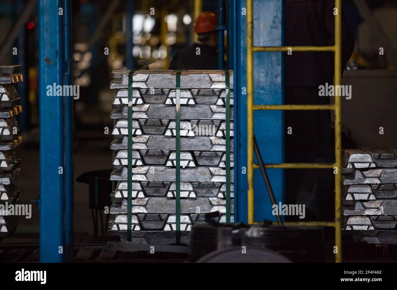 Aluminium electrolysis plant. Pallet of packed aluminum ingots on warehouse. Stock Photo