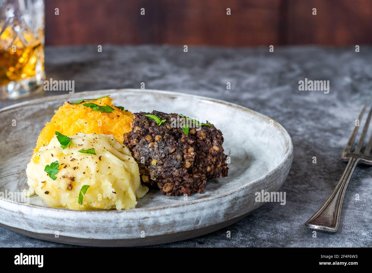 Haggis, neeps and tatties (haggis with turnips and potatoes) - traditional Scottish dish for Burns Night Stock Photo